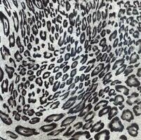 luxe léopard Contexte. animal imprimer. guépard fourrure. jaguar taches. neige léopard peau photo