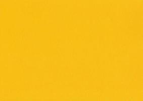 modèle simple de fond de texture de papier pastel jaune photo