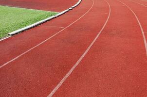 fonctionnement Piste et vert herbe, directe athlétisme fonctionnement Piste à sport stade photo