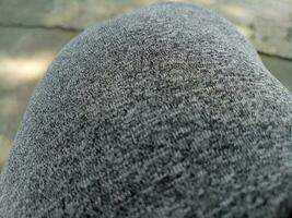 photo de le texture de une gris les pantalons de survêtement