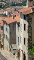 Rue de puy en velay, haute-loire, france photo