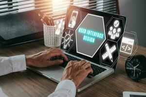 utilisateur interface conception concept, la personne en utilisant portable ordinateur avec utilisateur interface conception icône sur virtuel filtrer. photo