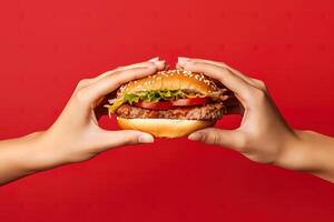 mains en portant une Hamburger isolé sur rouge Contexte. ai généré photo