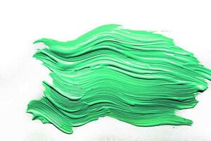 abstrait vert acrylique peint Contexte. fluide art texture photo