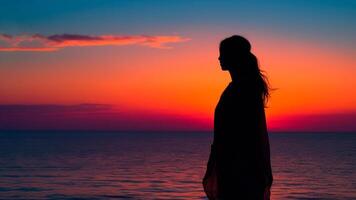 silhouette de une fille sur le Contexte de le mer le coucher du soleil ciel génératif ai photo