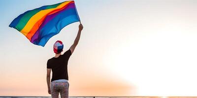 garçon agitant arc en ciel drapeau. concept de lgbt fierté. ai généré photo