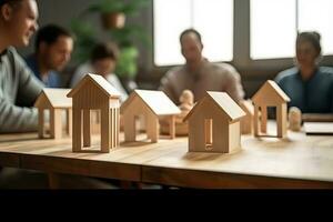 en bois jouet Maisons sur le table dans le bureau. le concept de achat et vente réel domaine. réel biens affaires réunions sans pour autant visage avec beaucoup Maisons, ai généré photo