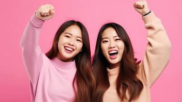 deux content asiatique femmes souriant et à la recherche à caméra isolé plus de rose Contexte. génératif ai. photo