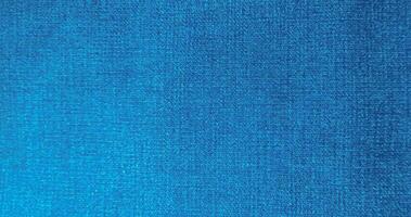 lumière bleu Couleur abstrait denim veste, ancien denim jeans tissu et en tissu proche en haut macro photo pour Contexte