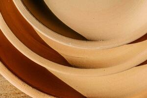 abstrait Contexte et texture de terre cuite assiettes. photo