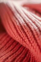 tricoté texture de une rose chandail ou écharpe fermer. photo