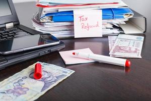 documents de remboursement d'impôt, situation financière, photo