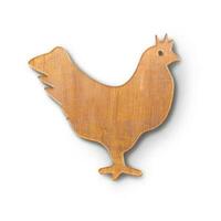 proche en haut vue en bois Coupe planche avec poulet forme en forme pour cuisine concept. photo