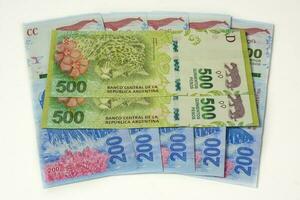 argentin pièces de monnaie et billets de banque photo