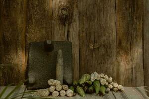 dans le rustique cuisine, le en bois métate broie maïs, création nourriture et talent artistique photo