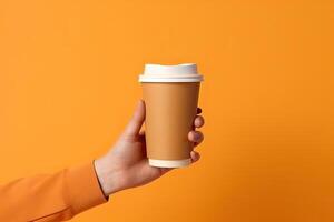 génératif ai illustration de papier café tasse dans une main, isolé Orange Contexte photo