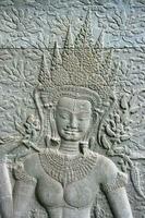 bas le soulagement de un apsara Danseur à angkor wat dans siem recueillir photo