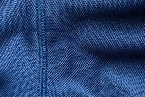 bleu des sports Vêtements en tissu Football chemise Jersey texture avec des points de suture photo