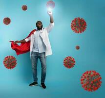 médical actes comme une super-héros à bats toi pandémie de covid19 coronavirus. bleu Contexte photo