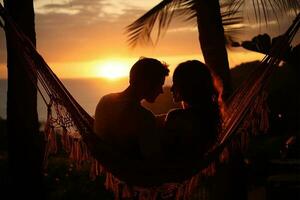 silhouette de Jeune couple relaxant dans hamac sur tropical plage à le coucher du soleil ai généré photo