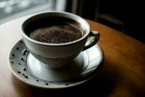 une tasse de café séance sur Haut de une soucoupe. ai généré photo