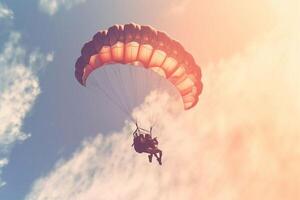 parapente monte en flèche dans le ciel. le coucher du soleil. génératif ai photo