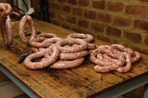 Fait main saucisses traditionnel préparation, patagonie, Argentine photo