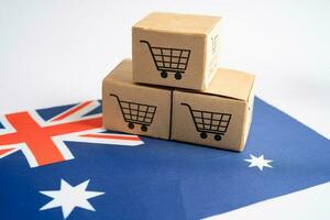 boîte avec achats en ligne Chariot logo et Australie drapeau, importer exportation achats en ligne ou Commerce la finance livraison un service boutique produit expédition, commerce, fournisseur concept. photo