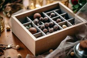 Chocolat boîte dans le cuisine table nourriture la photographie ai généré photo