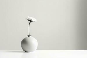 une monochromatique photographier de une Célibataire fleur dans une minimaliste vase contre une plaine Contexte. génératif ai photo