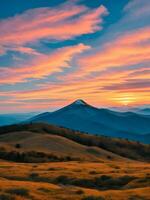 le coucher du soleil dans le montagnes avec brillant couleurs photo