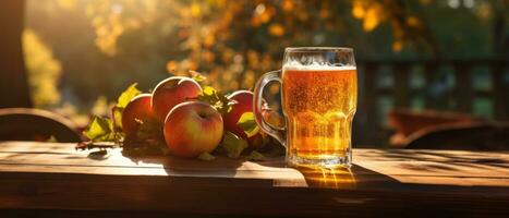 Pomme Cidre sur table avec pommes photo