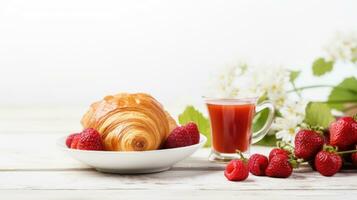 petit déjeuner avec café et croissant photo