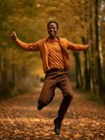 africain homme dans émotif dynamique pose sur l'automne Contexte ai génératif photo