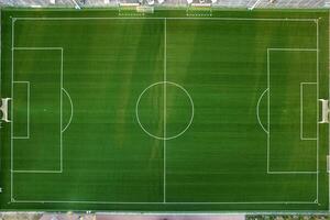 aérien vue de une vert champ pour en jouant Football photo