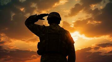soldat silhouette saluer à lever du soleil symbolisme la défense nationale fidélité le respect photo