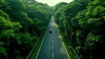 génératif ai, aérien vue de route entre vert forêt, vert paysage photo