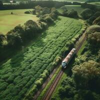 un aérien vue de une train qui passe par une luxuriant campagne génératif ai photo