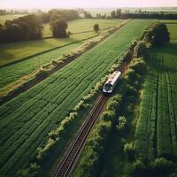 un aérien vue de une train qui passe par une luxuriant campagne génératif ai photo