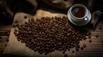 grains de café sur table en bois photo