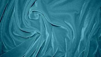 bleu velours en tissu texture utilisé comme Contexte. océan Couleur panne en tissu Contexte de doux et lisse textile matériel. écrasé velours .luxe marine Ton pour soie. photo