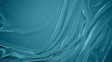 bleu velours en tissu texture utilisé comme Contexte. océan Couleur panne en tissu Contexte de doux et lisse textile matériel. écrasé velours .luxe marine Ton pour soie. photo