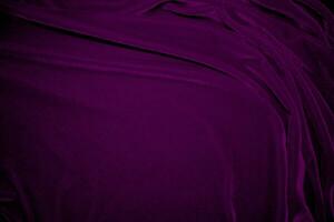 rose velours en tissu texture utilisé comme Contexte. du vin Couleur panne en tissu Contexte de doux et lisse textile matériel. écrasé velours .luxe magenta Ton pour soie. photo