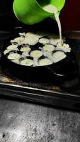 processus à cuisine takoyaki plus populaire délicieux casse-croûte photo