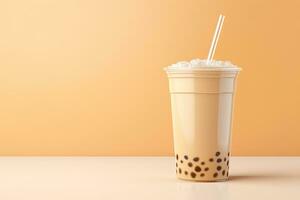 glacé Lait thé et bulle boba dans le Plastique verre sur le beige Contexte. ai généré photo