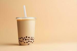 glacé Lait thé et bulle boba dans le Plastique verre sur le beige Contexte. ai généré photo