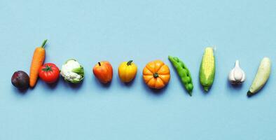 beaucoup des légumes et des fruits sur bleu turquoise Contexte. en bonne santé nourriture concept photo