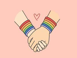 en portant mains avec lgbt bracelets symbolisant l'amour entre gays ou lesbiennes ou tolérance photo