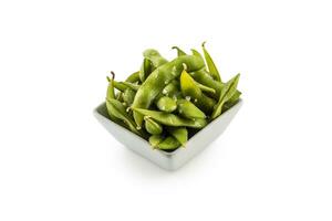 Japonais asiatique nourriture Edamame grignote, bouilli vert soja haricots. photo