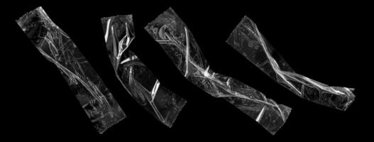 adhésif Plastique ruban ensemble isolé sur noir Contexte photo